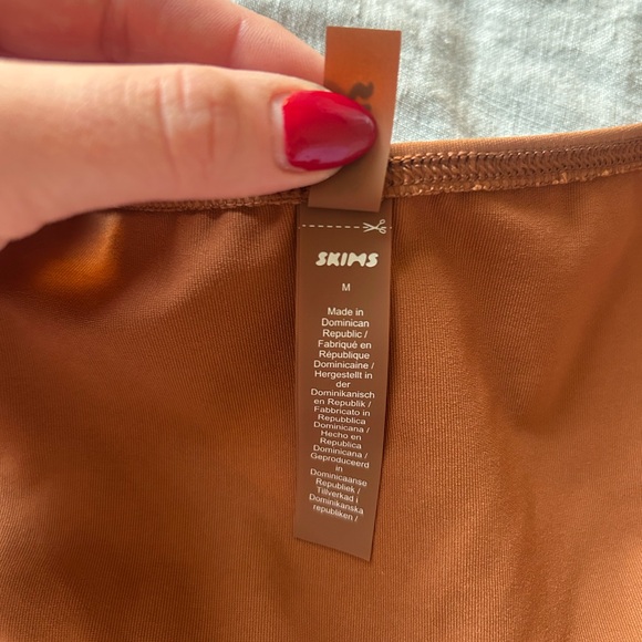 SKIMS Dipped Bikini Bottom, Bronze - Picture 9 of 10